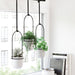 NSIMG-SHA256:2cf89ee8f90b9556ebb422505ef721e2d52ddfbefdd6b8b473326d9dffc101c8 · Isalbi Umbra Triflora Hanging Planter White & Black