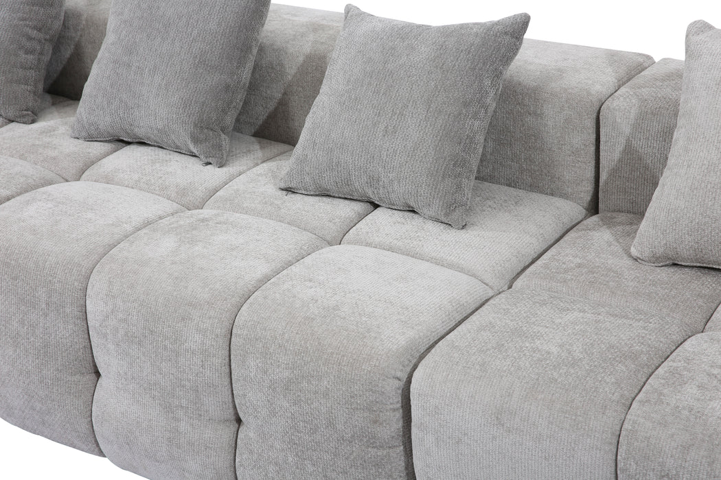 Experience flexible comfort with our modular sofa. Crafted from durable tech fabric, its configurable modules and complementary ottomans effortlessly adapt to any space—from living rooms and conference areas to hotel lounges.