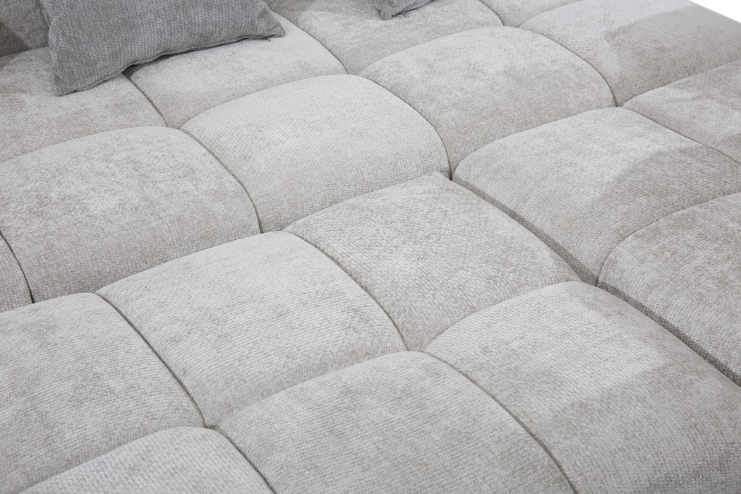 Experience flexible comfort with our modular sofa. Crafted from durable tech fabric, its configurable modules and complementary ottomans effortlessly adapt to any space—from living rooms and conference areas to hotel lounges.