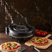 NSIMG-SHA256:f07d9cc29cc6c831933cff10eec94e2161fea0e6a91fd2a81e434defc238715f · Isalbi MasterPro The Ultimate Pizza Oven Black
