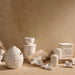 NSIMG-SHA256:2be2ff66c0e0c63904abb4c1b1d5237ebd1749cdcbd929efd71ab0fd5db60ebf · Isalbi Davis & Waddell Wildflower & Hive Egg Cups 2pcs Set White