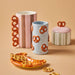 NSIMG-SHA256:0ff07fa800f4c1eb07cf1418d7f3ad7531b8036634e33bb6338fb93597882115 · Isalbi Emporium Pierre Pretzel Vase Pink & Brown