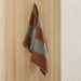 NSIMG-SHA256:1a7a4b791f79fe5f6101fad1cdc00b2aa1237273ddfd8713e58ac224af06b57c · Isalbi Amalfi Velora Stitch Throw Brown/Grey
