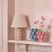 NSIMG-SHA256:db32dd513ebd421afc4050578ad626768aaa542bf0be3604b987e178d20c4e88 · Isalbi Emporium Ribbon Bud Vase Blue