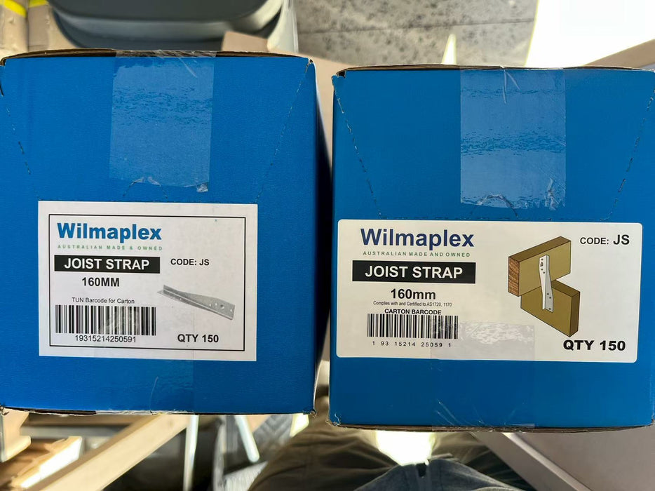 Two blue boxes with Wilmaplex labels on a reflective surface

